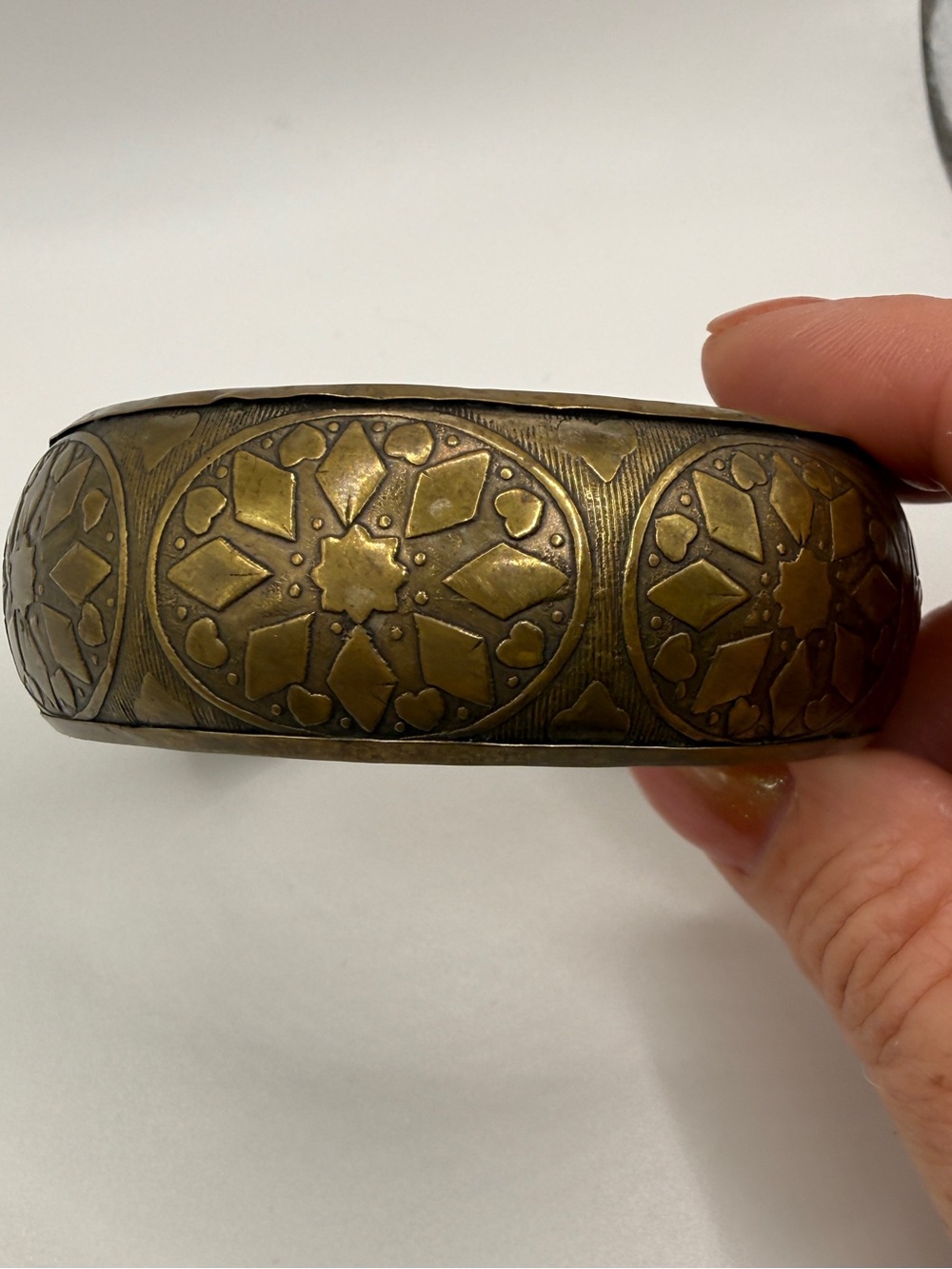 Vintage Brass Decorative Bangle with Ornate Medallion Pattern - Gold